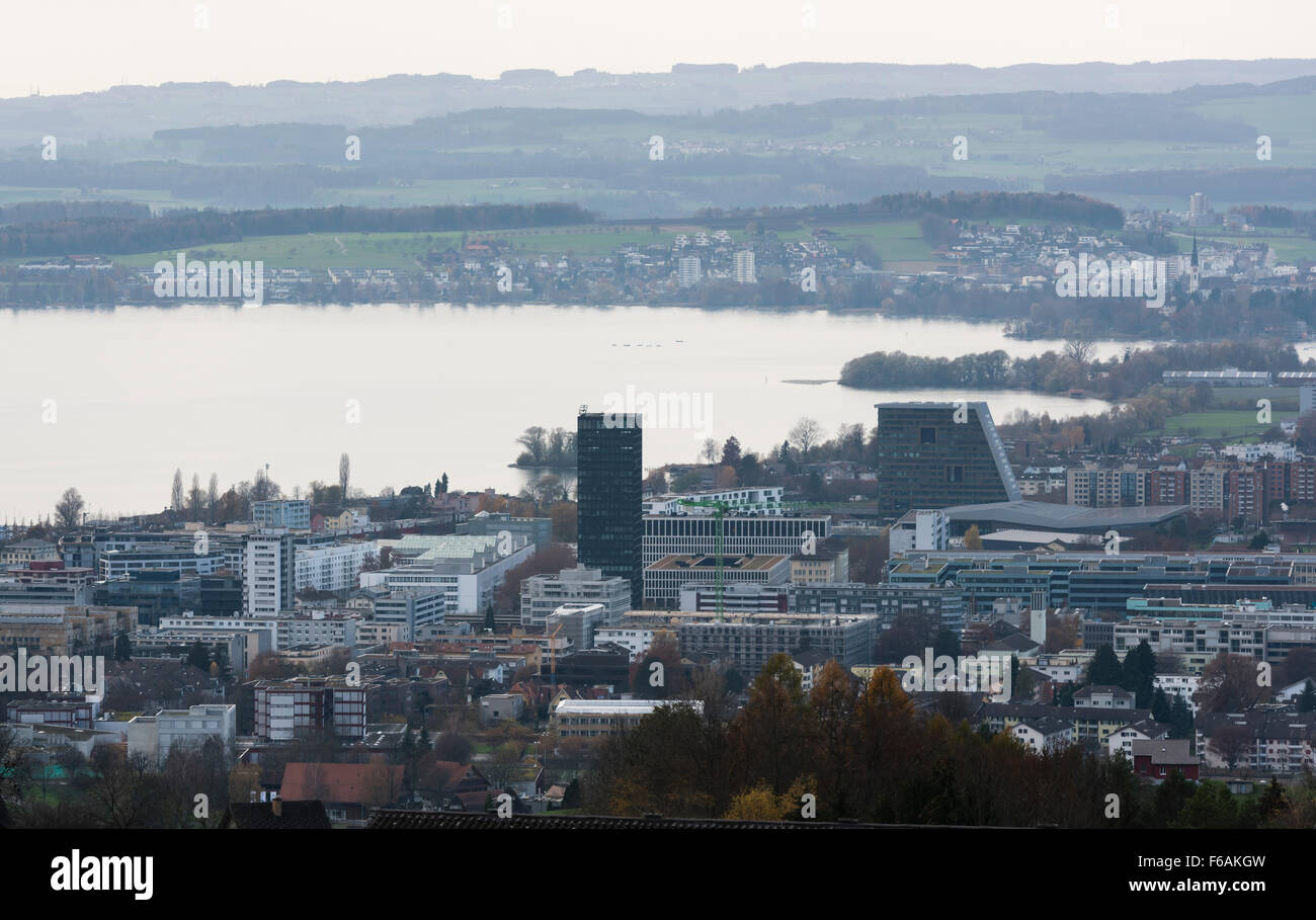 The Swiss city of Zug with 'Park-Tower' (left high-rise), the 'Uptown' building (right high-rise) and Lake Zug in the background Stock Photo