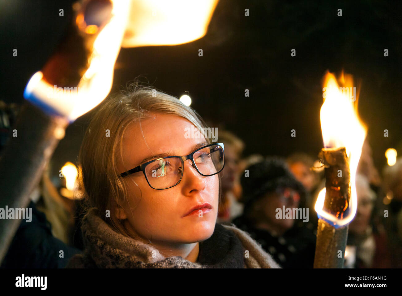 Copenhagen, Denmark. 15th November, 2015. Young woman participates in a Copenhagen sympathy rally with the victims of Friday’s Paris terror attacks. Some 15.000 joined the rally where thePM and the French ambassador spoke. Credit:  OJPHOTOS/Alamy Live News Stock Photo