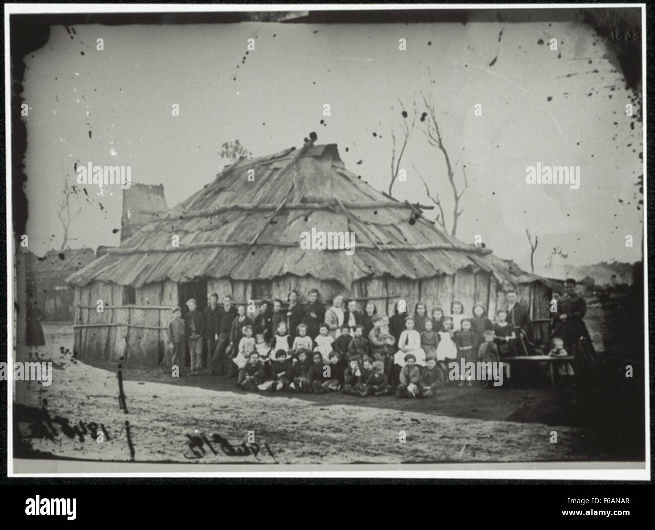 Gulgong Private School - [group photo outside slab hut school house] Stock Photo