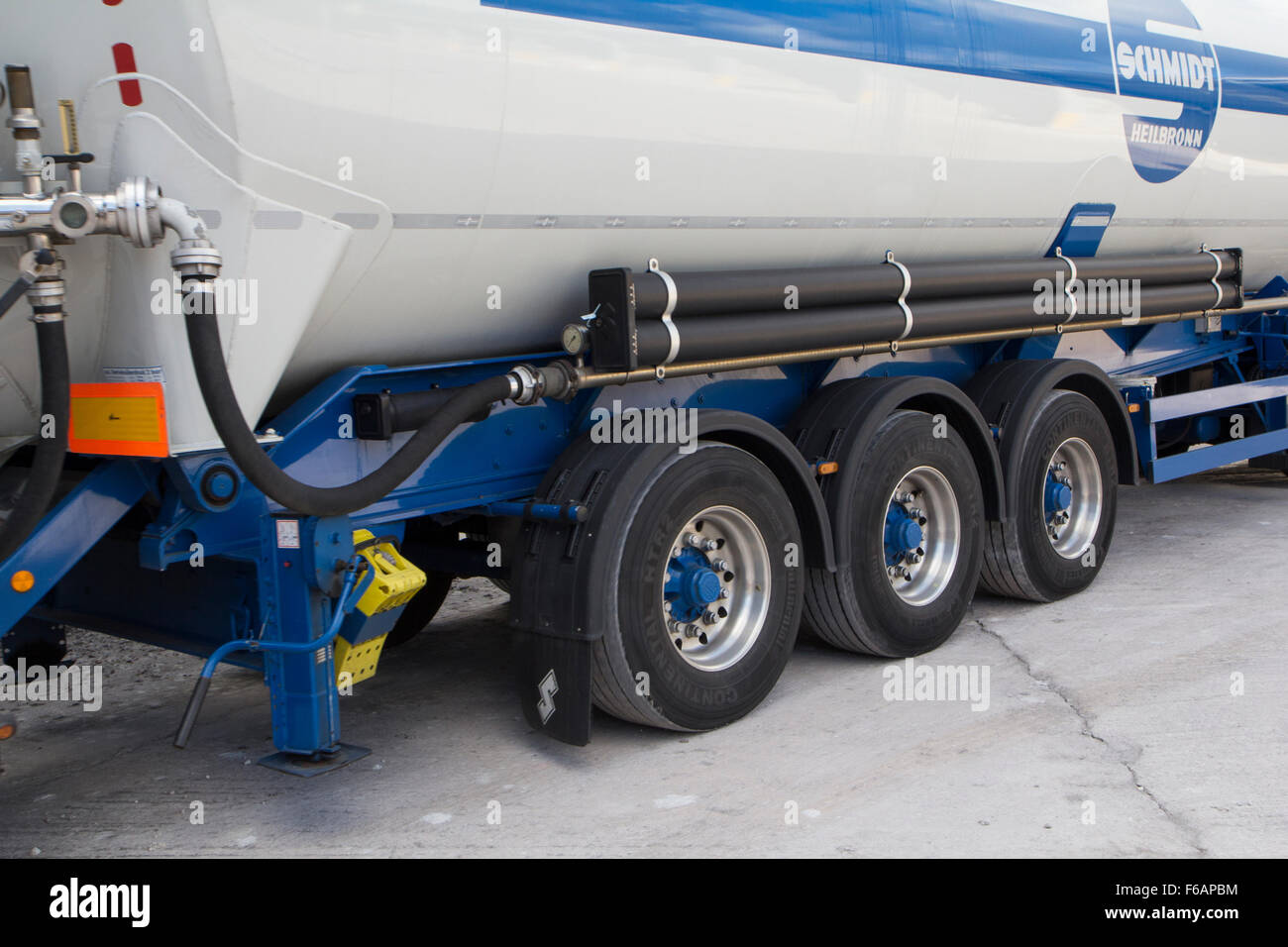 A bulk powder tanker belonging to the Schmidt company showing various details of the vehicle at a loading point of Ball clay Stock Photo