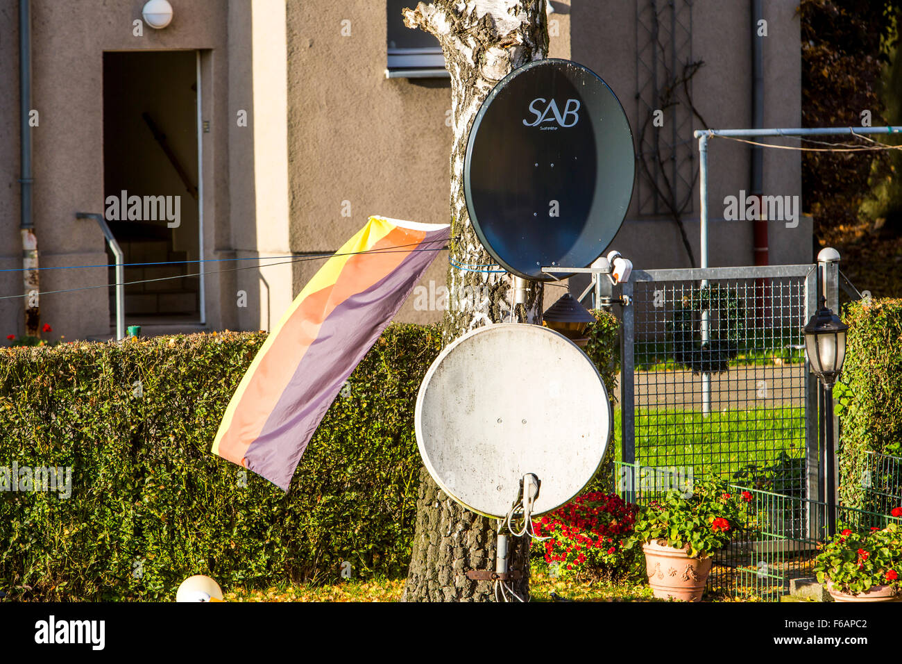 TV satellite antennas in the front yard of a home in Gelsenkirchen