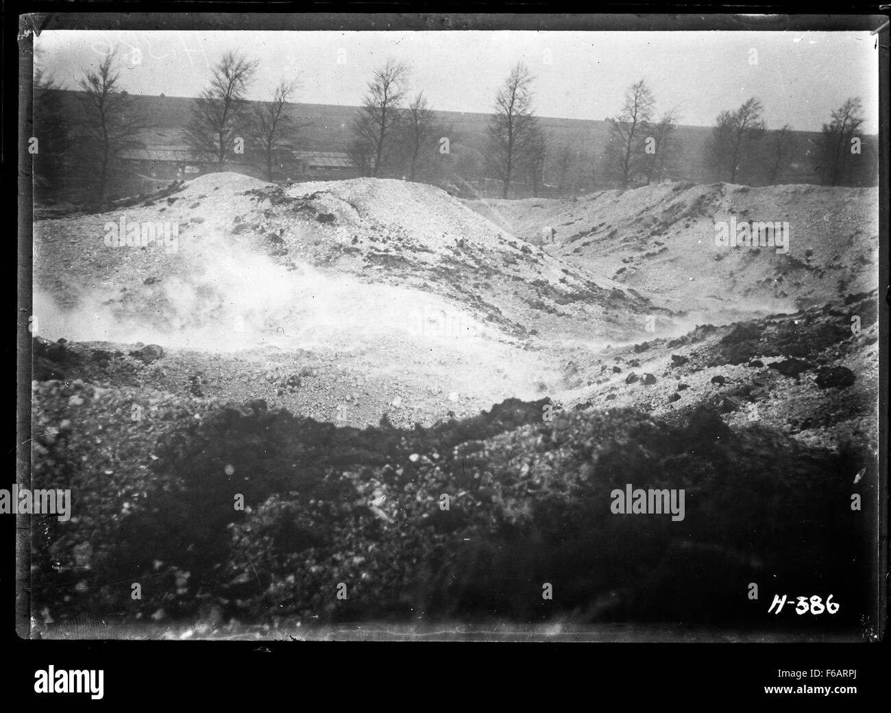 The crater caused by the destruction of damaged German explosives, Stock Photo