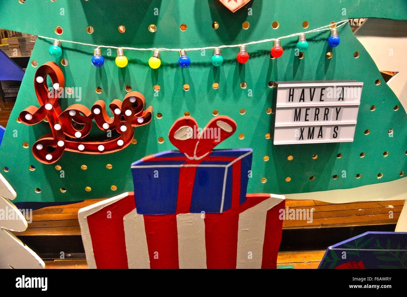 Christmas decorations in the window of the shop Urban Outfitters on