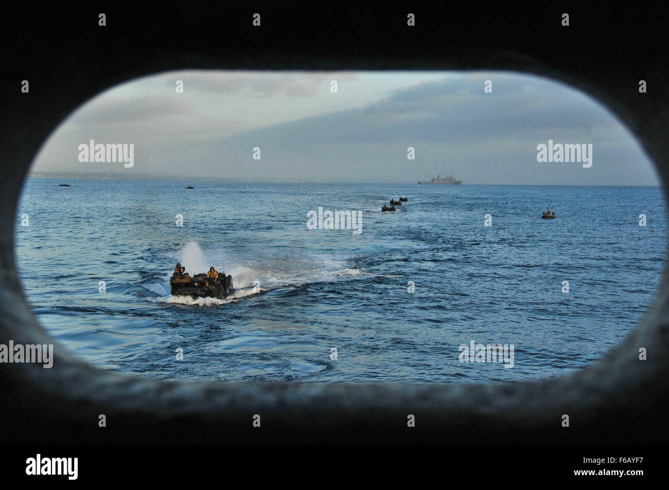 150831-N-WK391-032 PACIFIC OCEAN (August 31,2015) Amphibious assault vehicles prepare to enter the well deck of the amphibious transport dock ship USS New Orleans (LPD 18), during Exercise Dawn Blitz 2015 (DB-15). DB-15, being conducted from Aug. 31- Sept. 9, 2015 by Expeditionary Strike Group 3 (ESG-3) and 1st Marine Expeditionary Brigade (1stMEB), is a multinational training exercise between the U.S., Japan, Mexico and New Zealand which conducts live, simulated, and constructive operations to enhance each country’s ability to activate and deploy an Amphibious Task Force with speed and effect Stock Photo