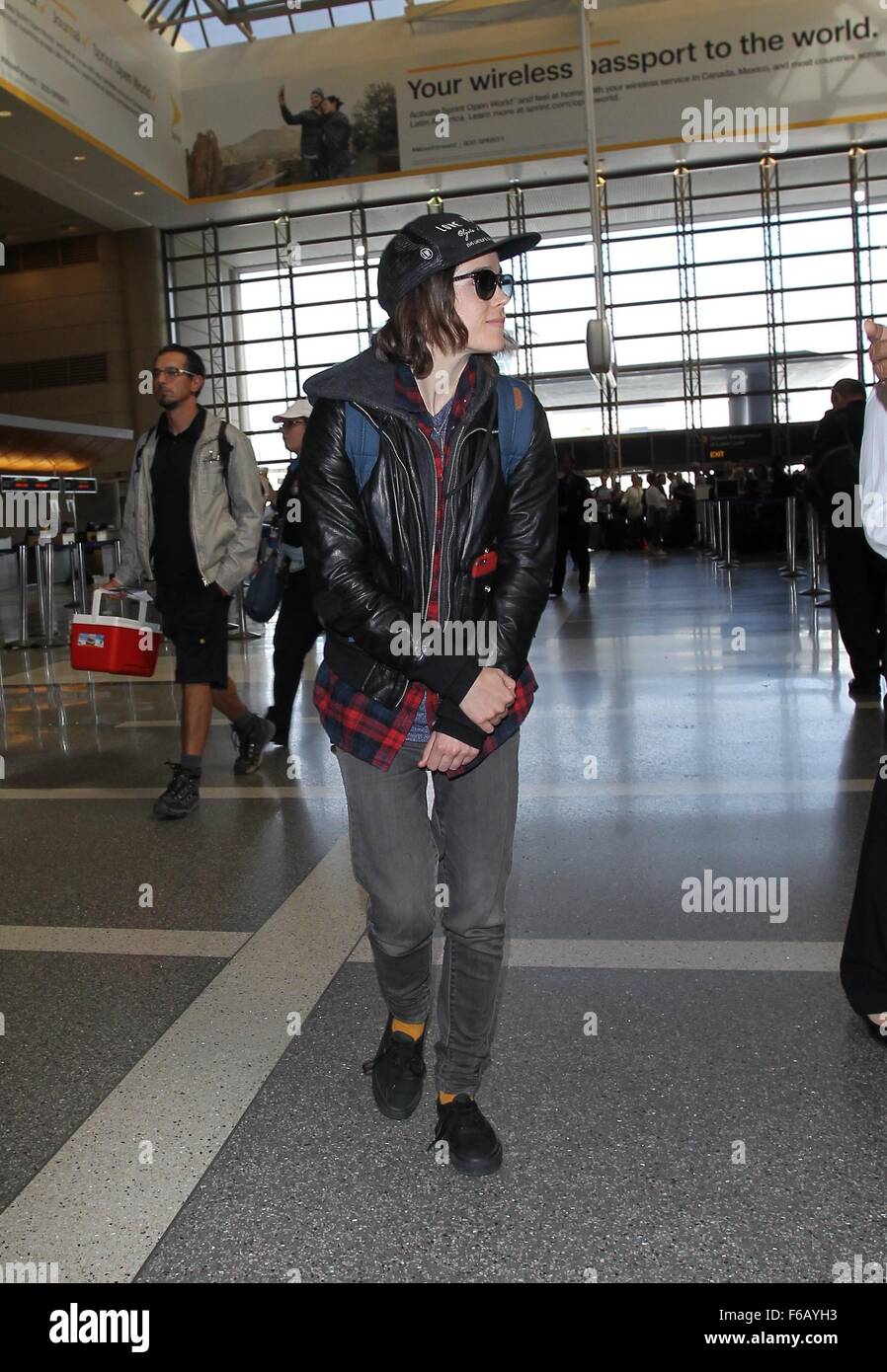 Ellen Page and her girlfriend Samantha Thomas depart from Los Angeles International Airport (LAX)  Featuring: Ellen Page Where: Los Angeles, California, United States When: 15 Oct 2015 Stock Photo