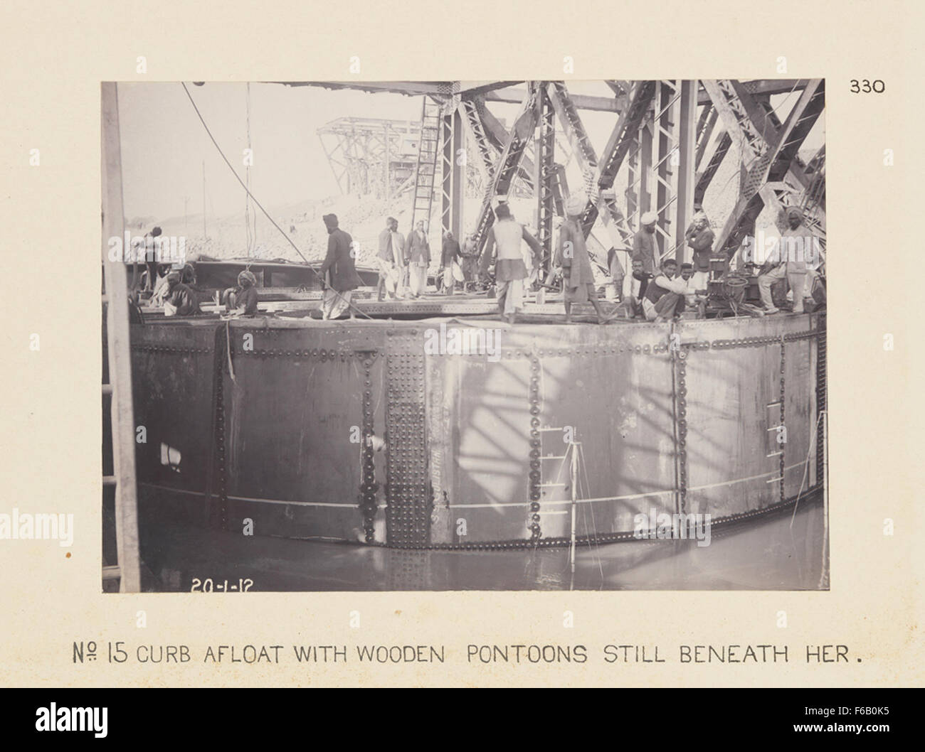 This image shows a bridge construction featuring wooden pontoons ...