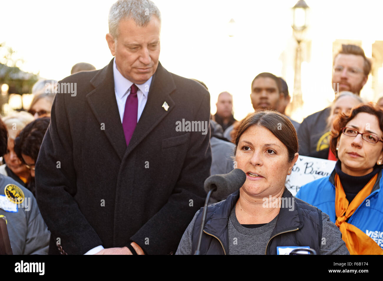 New York City, United States. 15th Nov, 2015. Samara Daly of Families for Safe Streets speaks as mayor de Blasio listens. Transportation Alternatives held its World Day of Remembrance for victims of traffic accidents with speeches by mayor de Blasio, other public officials and a march from city hall to the United Nations Credit:  Andy Katz/Pacific Press/Alamy Live News Stock Photo