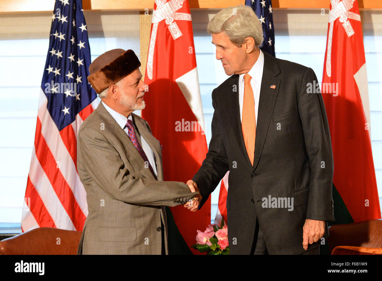 Secretary Kerry Shakes Hands With Omani Foreign Minister bin Alawi Before Their Meeting in New York City Stock Photo