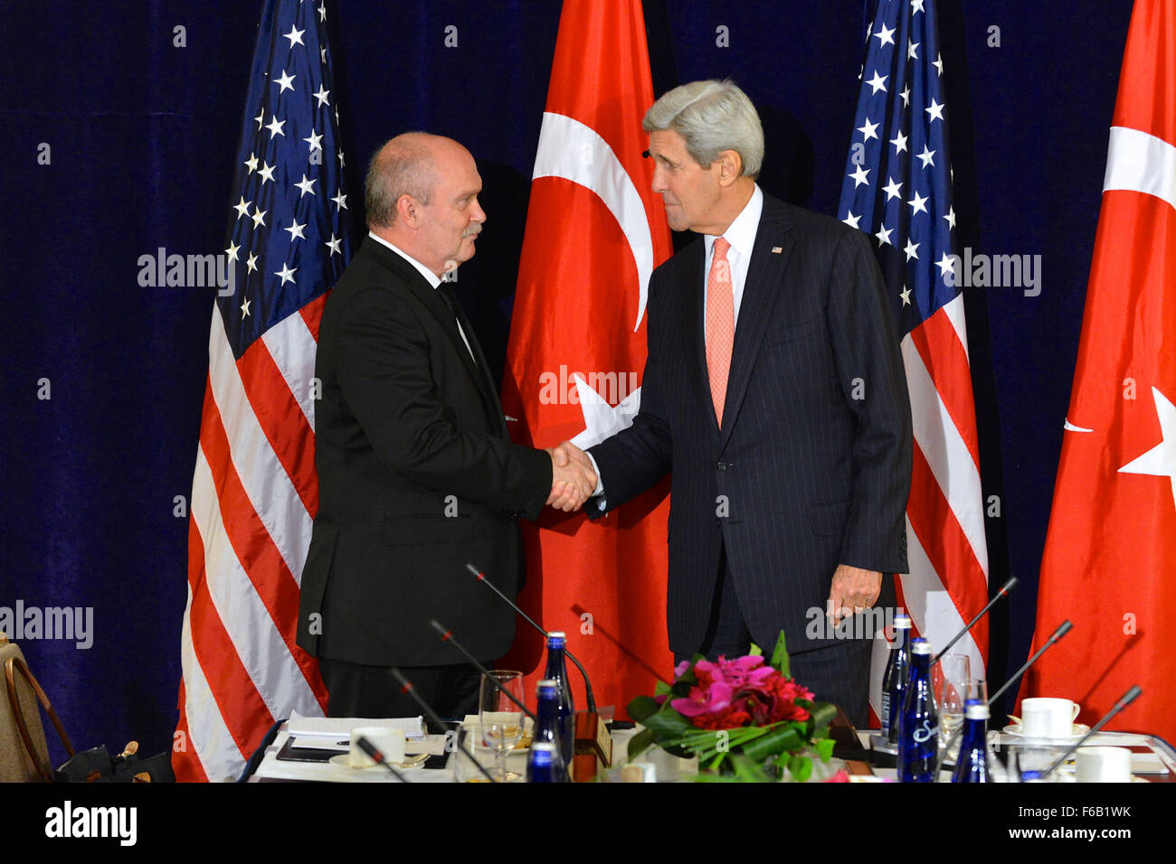 Secretary Kerry Shakes Hands With Turkish Foreign Minister Sinirlioglu Before Their Meeting in New York City Stock Photo