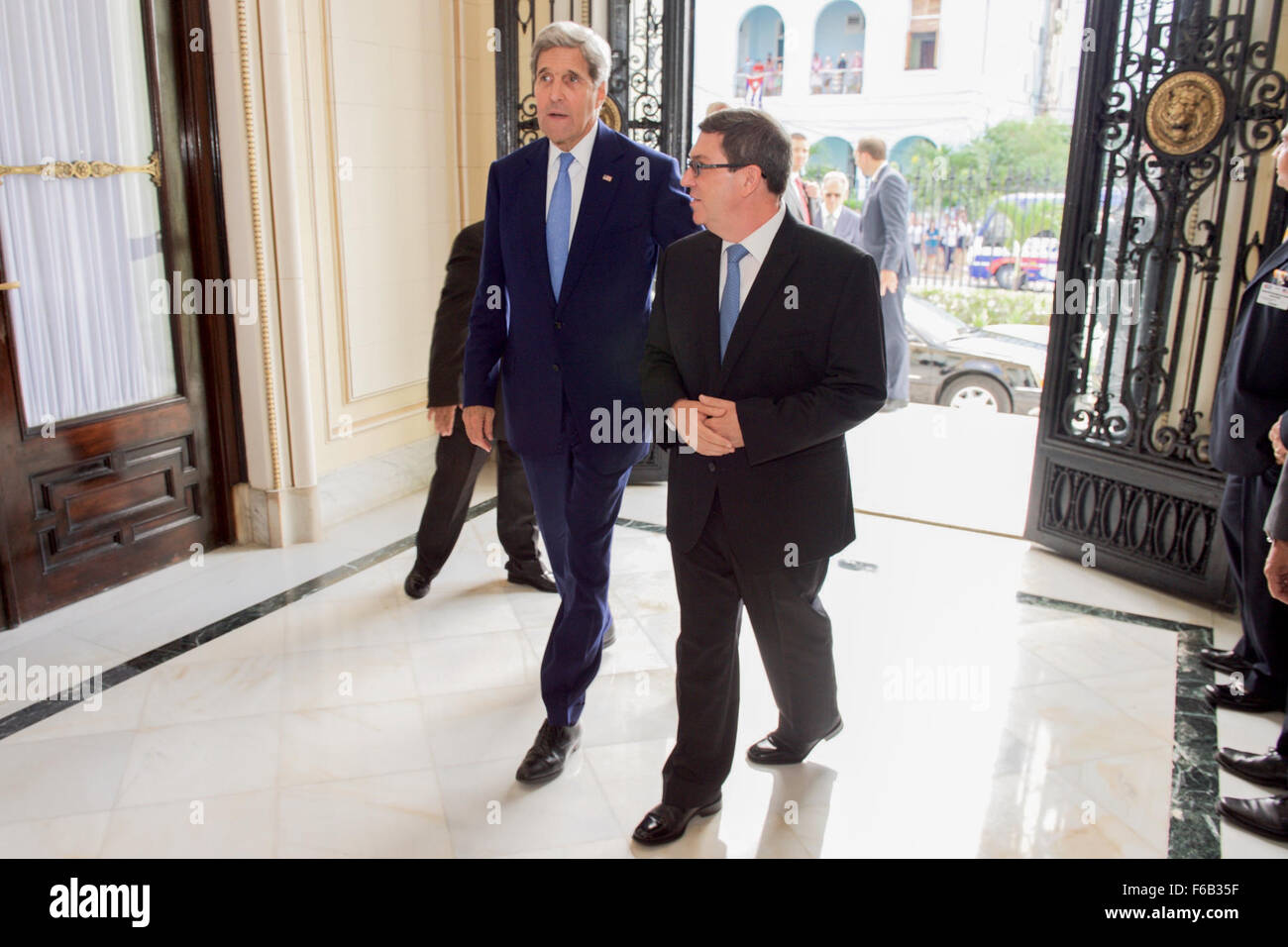 Secretary Kerry and Cuban Foreign Minister Rodriguez Enter the Cuban Ministry of Foreign Affairs Stock Photo