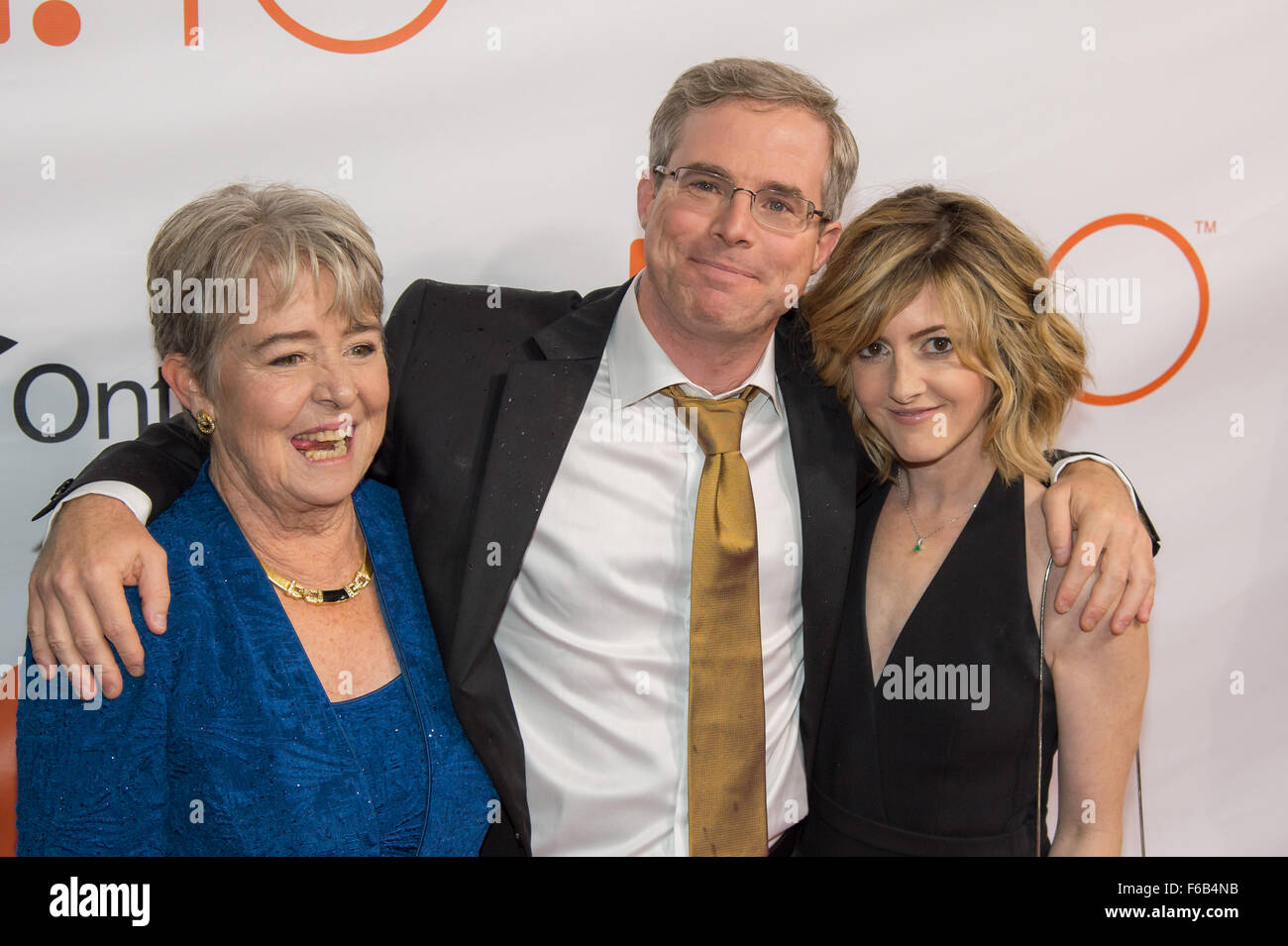Author Andy Weir, Weir's mother Janet Tuer and Weir's girlfriend Keri Kukral attend the world premiere for 'The Martian” on day two of the Toronto International Film Festival at the Roy Thomson Hall Friday, Sept. 11, 2015 in Toronto. NASA scientists and engineers served as technical consultants on the film. The movie portrays a realistic view of the climate and topography of Mars, based on NASA data, and some of the challenges NASA faces as we prepare for human exploration of the Red Planet in the 2030s. Photo Credit: (NASA/Bill Ingalls) Stock Photo