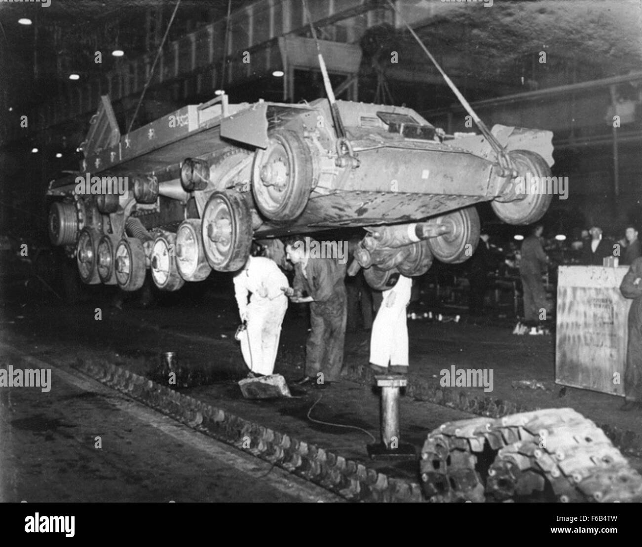 Lowering a Valentine tank on to its track Stock Photo