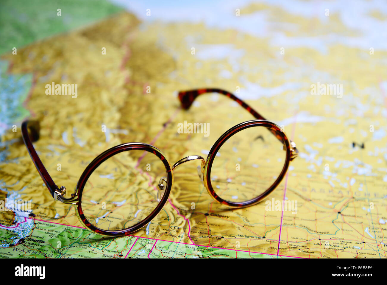 Glasses on a map - Canada Stock Photo