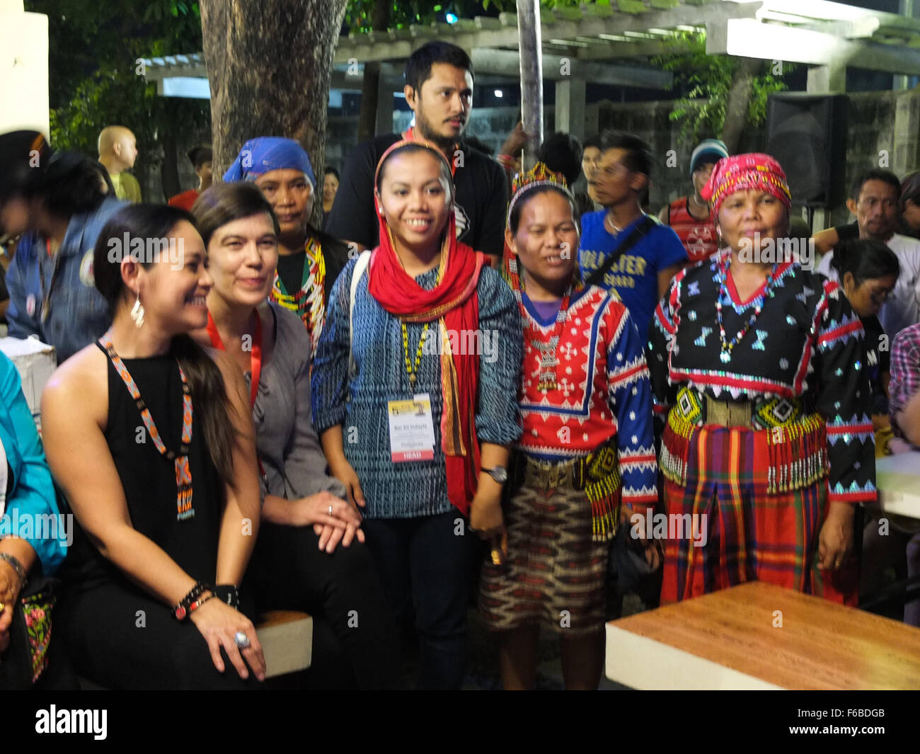 Stage Actress, Monique Wilson with foreign posed for a picture with Lumad women at the Kampuhan sa Baclaran headquarters. The Lumad peoples are a group of indigenous people of the southern Philippines. It is a Cebuano term meaning 'native' or 'indigenous'. The term is short for Katawhang Lumad (literally 'indigenous peoples'), the autonym officially adopted by the delegates of the Lumad Mindanao Peoples Federation (LMPF) founding assembly on 26 June 1986 at the Guadalupe Formation Center, Balindog, Kidapawan, Cotabato, Philippines. It is the self-ascription and collective identity of the indig Stock Photo