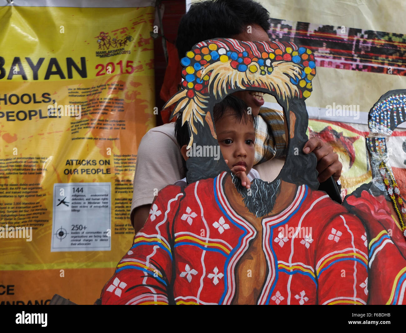 A boy peeping in the hole of a face of a Lumad life-size figure. The Lumad peoples are a group of indigenous people of the southern Philippines. It is a Cebuano term meaning 'native' or 'indigenous'. The term is short for Katawhang Lumad (literally 'indigenous peoples'), the autonym officially adopted by the delegates of the Lumad Mindanao Peoples Federation (LMPF) founding assembly on 26 June 1986 at the Guadalupe Formation Center, Balindog, Kidapawan, Cotabato, Philippines. It is the self-ascription and collective identity of the indigenous peoples of Mindanao. (Photo by Josefiel Rivera/Pa Stock Photo
