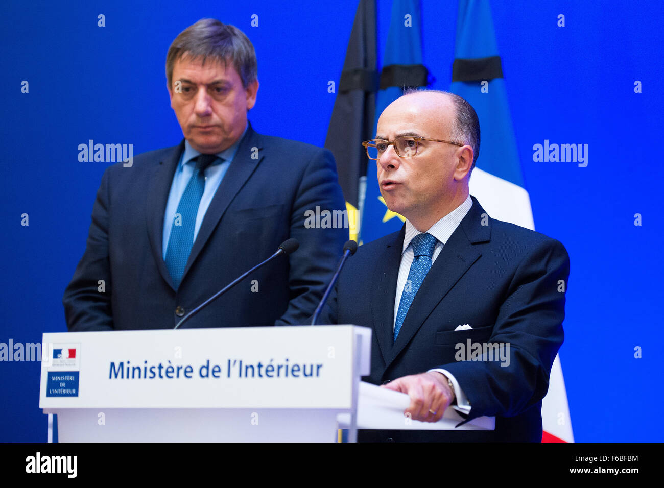 Paris, France. 15th Nov, 2015. French Interior Minister Bernard Cazeneuve (r) and his Belgian counterpart Jan Jambon speak during a press conference at the French Interior Ministry in Paris, France, 15 November 2015. At least 129 people were killed in a series of terrorist attacks in Paris on the night of 13 Novmber to 14 November 2015. Photo: Marius Becker/dpa/Alamy Live News Stock Photo