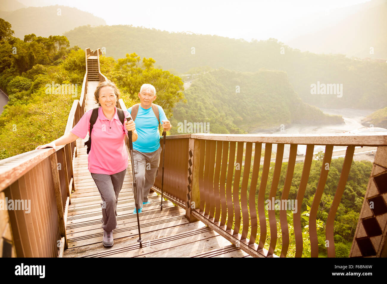 Happy man hiking mountains hi-res stock photography and images - Alamy