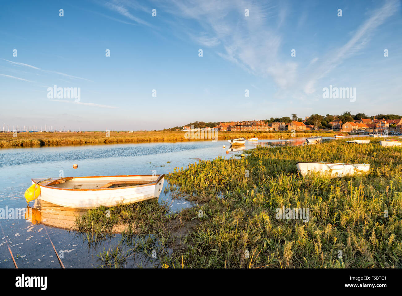 Boats on the marshes at Blakeney on the Norfolk Coast Stock Photo