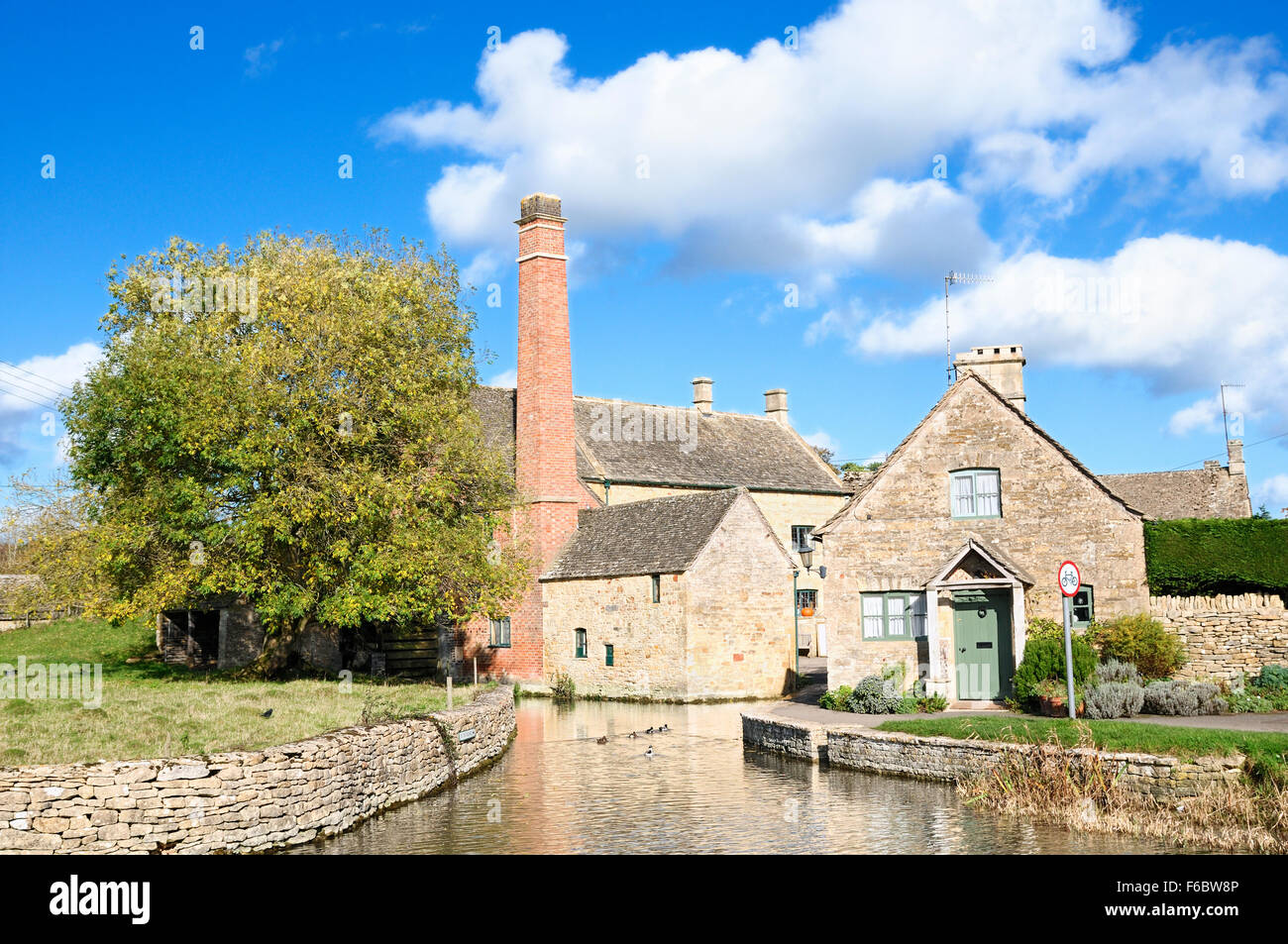 The Old Mill in Lower Slaughter, Cotswolds, Gloucestershire, England, UK Stock Photo