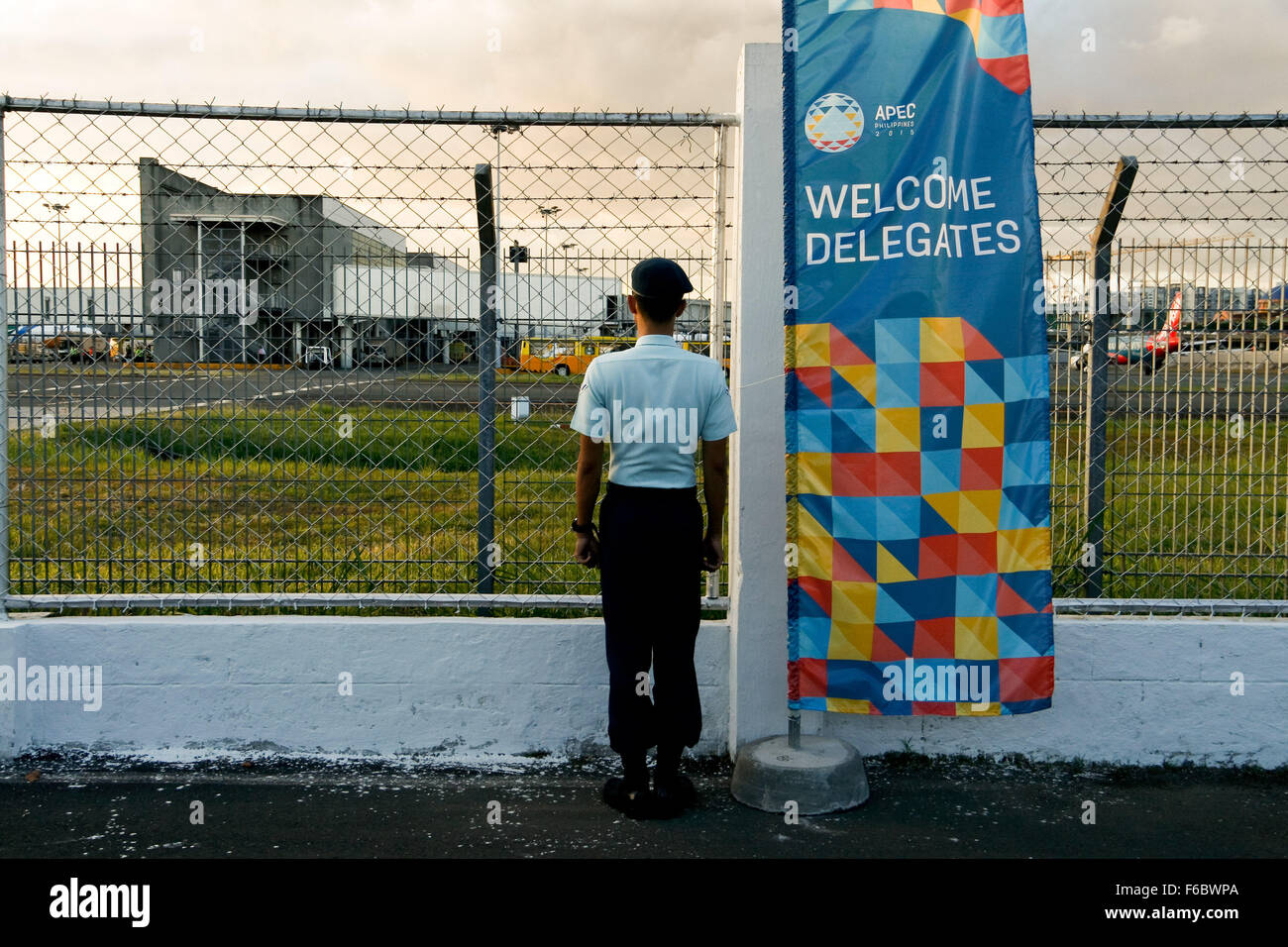 An airman of the Philippine Airforce stand in attention as hundreds of