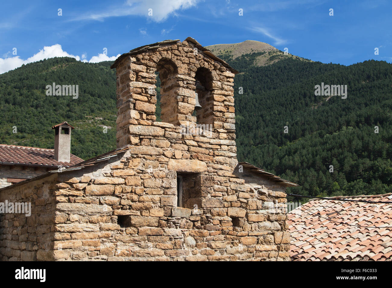 Bell gable of the Sant Climent church in Iran, Lleida, Catalonia. Stock Photo