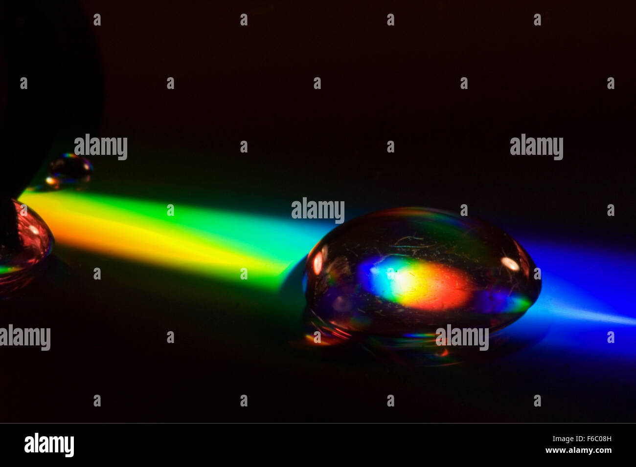 abstract rainbow drop in a plastic cd material Stock Photo - Alamy