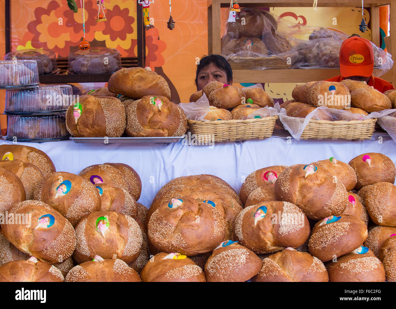 Women selling traditional Mexican Bread called Bread of the Dead in