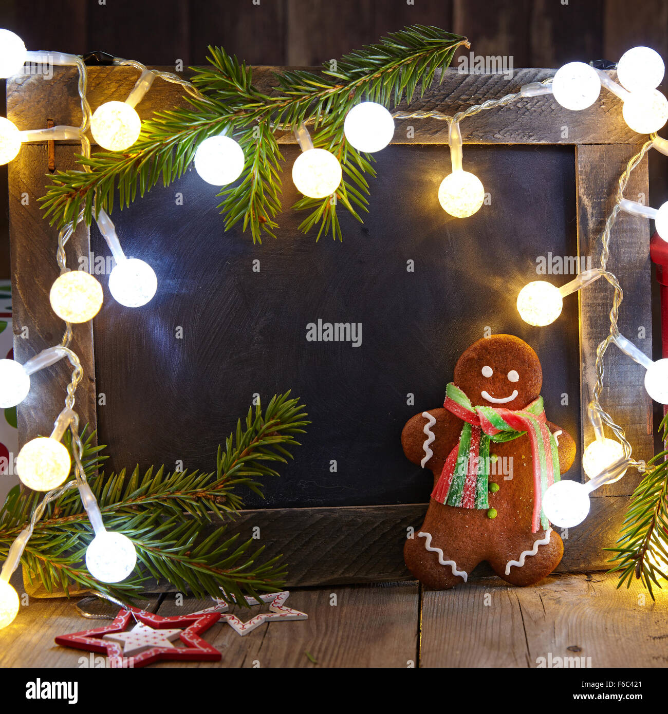 Christmas decoration with chalkboard and gingerbread man Stock Photo