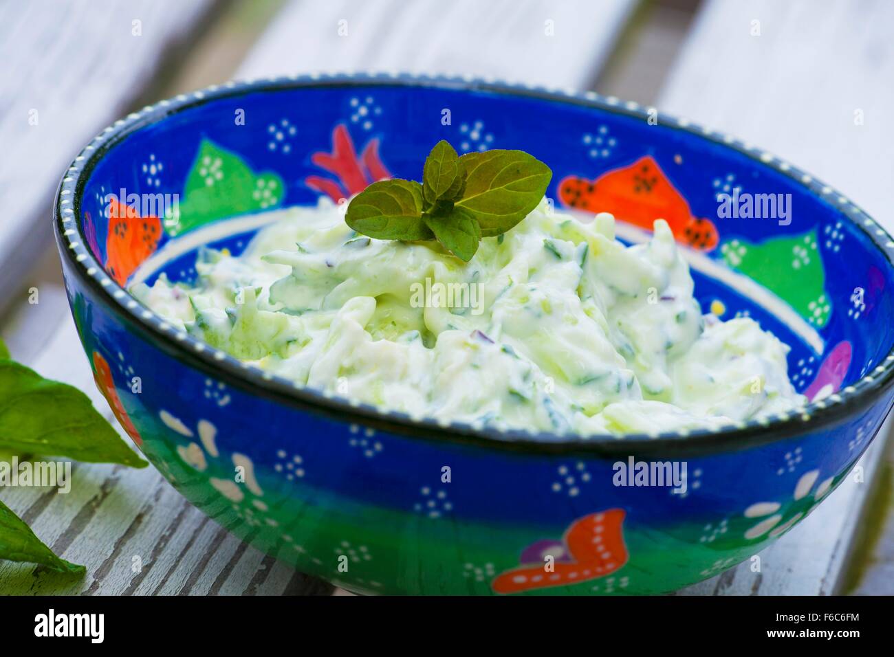 Cucumber salad with a sour cream dressing Stock Photo Alamy