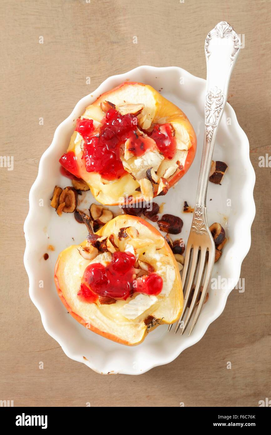 Apples stuffed with camembert and hazelnuts with cranberry jam Stock Photo Alamy