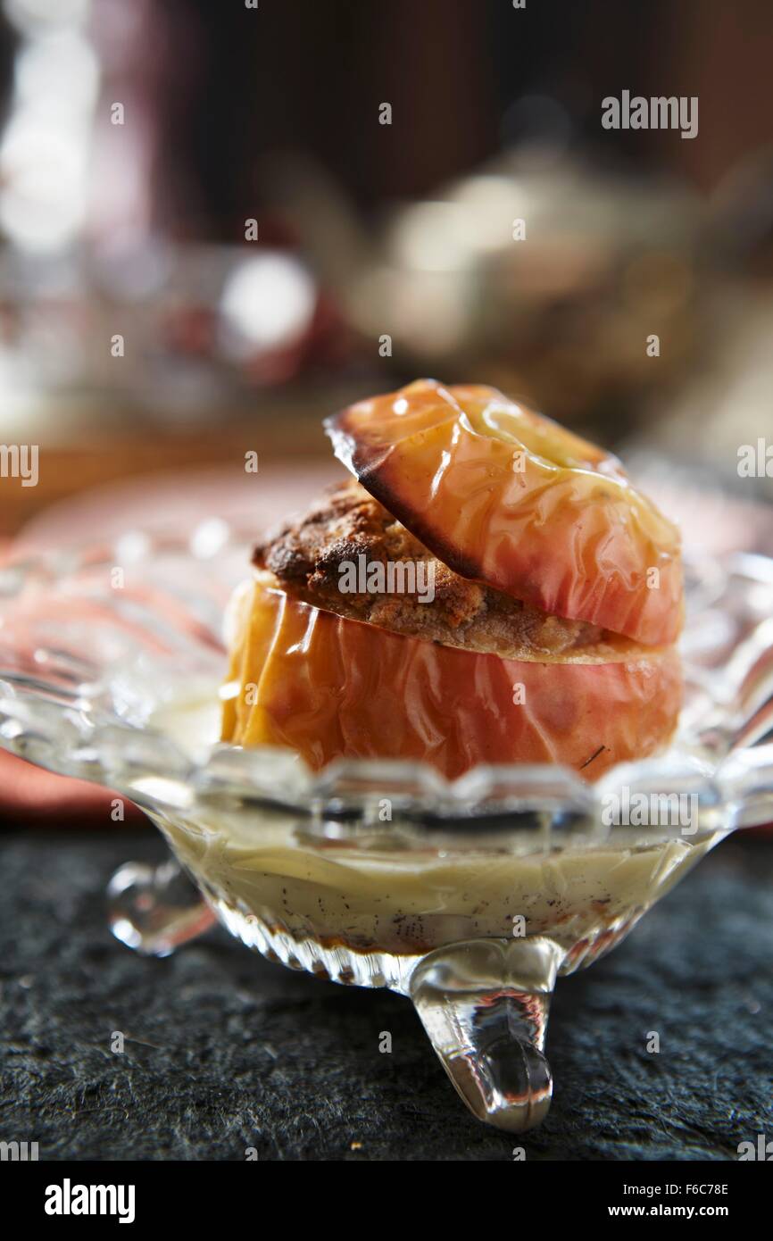 Baked apple with custard Stock Photo Alamy