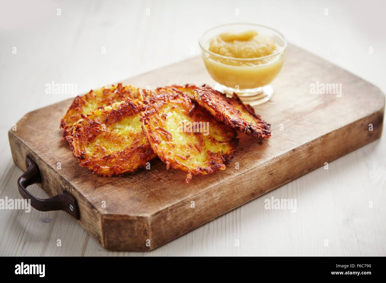 Potato röstis with apple puree Stock Photo
