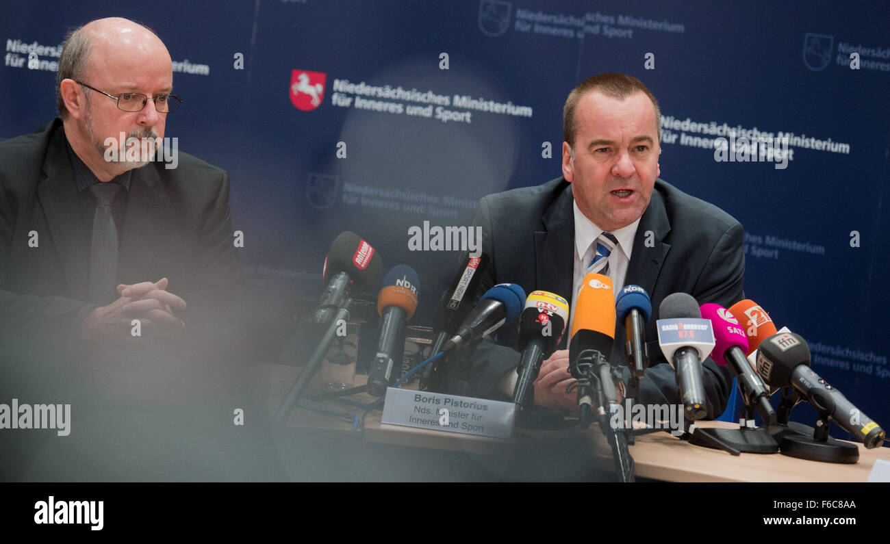 Hanover, Germany. 16th Nov, 2015. Lower Saxony's Interior Minister Boris Pistorius (r, SPD) and Volker Kluwe, Police President of the Hannover's district police faction speak at a press conference in the Interior Ministry in Hannover in Hanover, Germany, 16 November 2015. The international soccer match between Germany and the Netherlands takes place in Hanover on 17 November 2015. There are increased security precautions for the game three days after the terror attacks in Paris. Photo: JULIAN STRATENSCHULTE/dpa/Alamy Live News Stock Photo