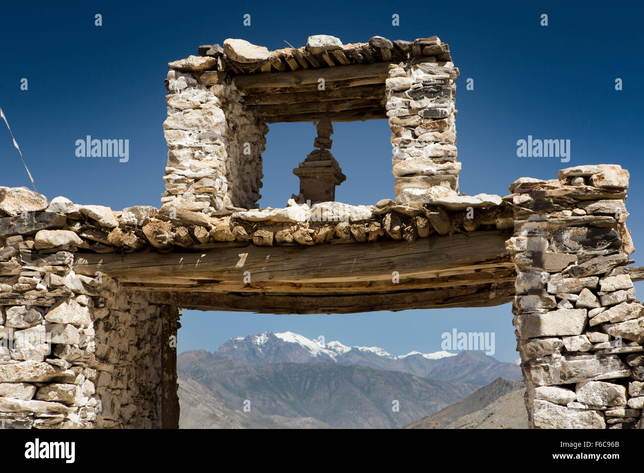 India, Himachal Pradesh, Yangthang, unusual, village gateway with Buhhist Chorten above for good luck travelling Stock Photo