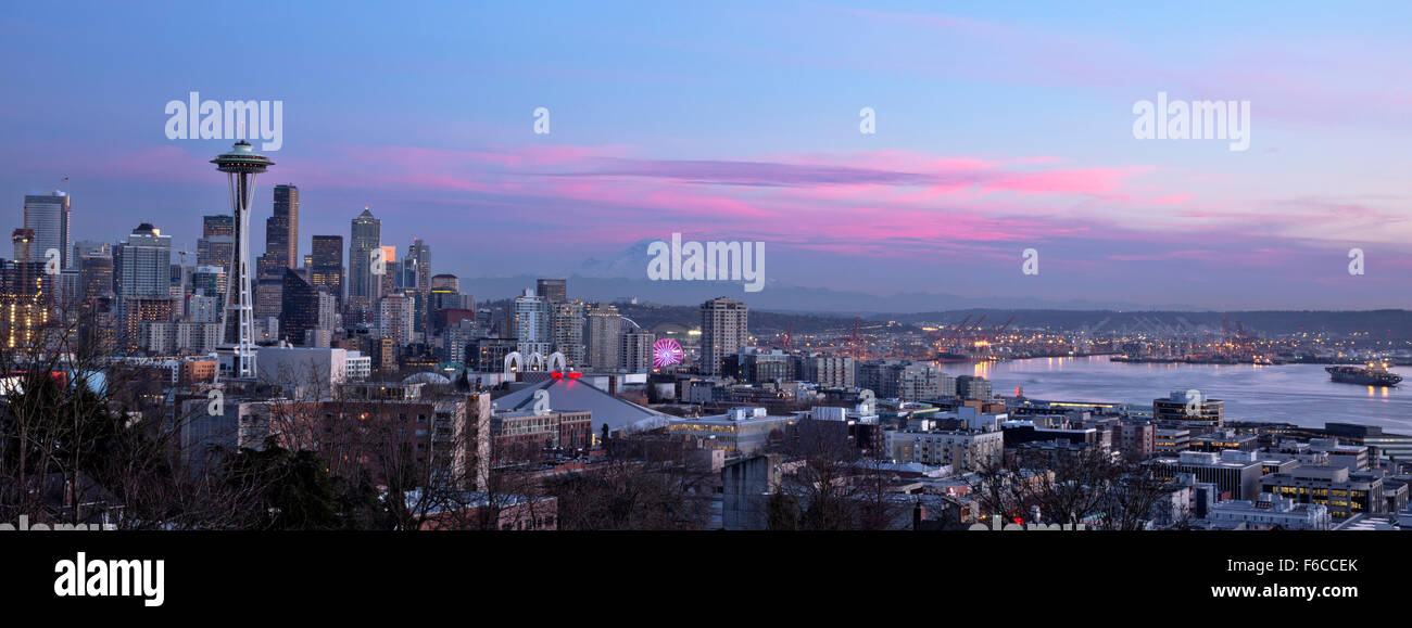 WA12044-00...WASHINGTON - Afterglow brightens the Space Needle, downtown Seattle and Mount Rainier, image from 2015. Stock Photo