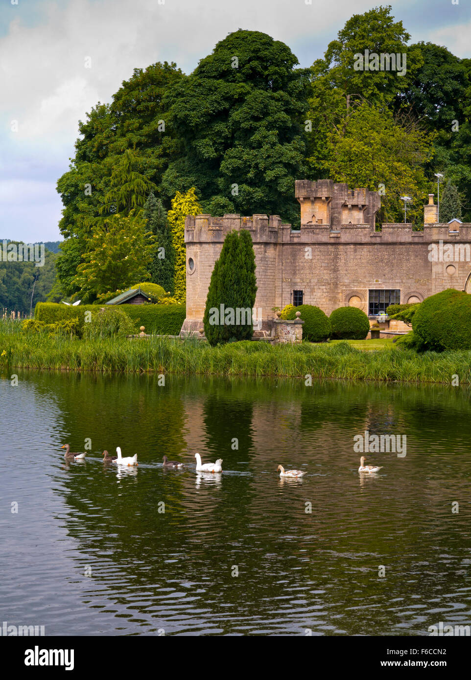 The Stable Block and Upper Lake at Newstead Abbey near Ravenshead Nottinghamshire England UK Stock Photo