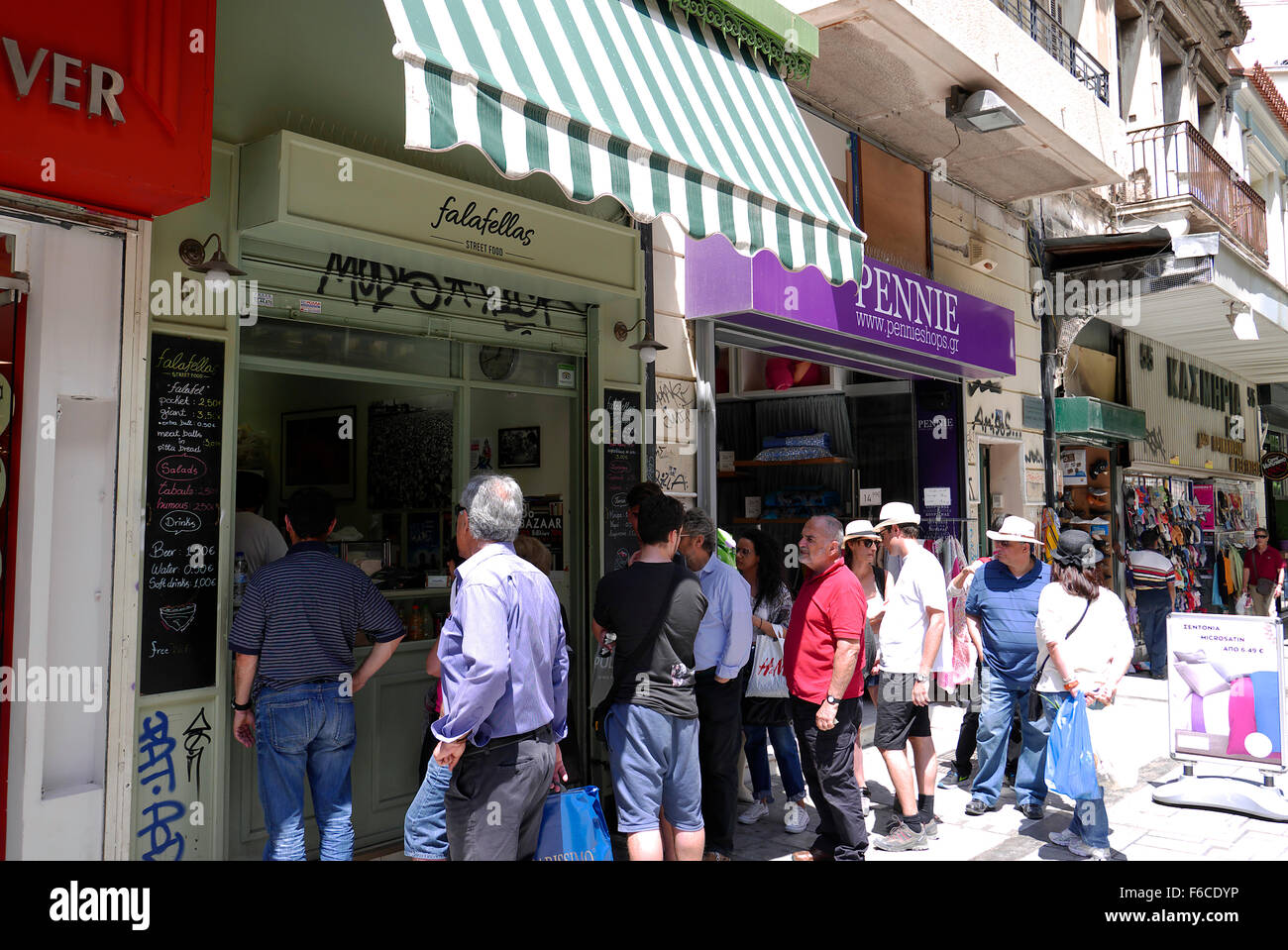 greece athens monastiraki aiolou street queueing outside falafellas fast food shop Stock Photo