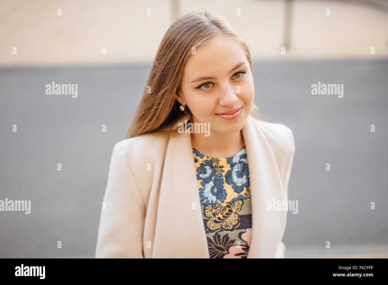Girl With Very Long Hair Standing On The Sunset Background Stock
