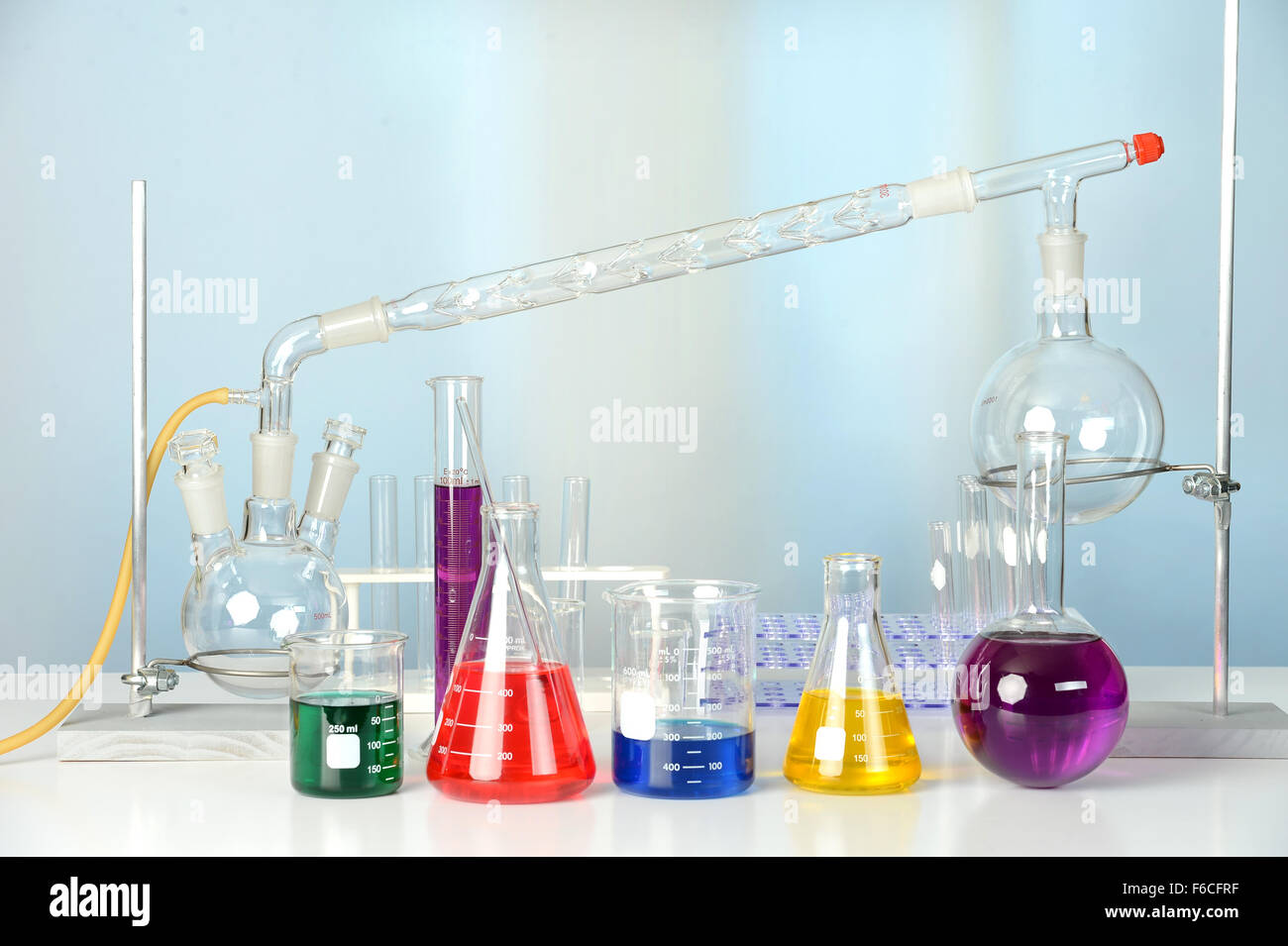 Laboratory glassware on lab table with window in background Stock Photo