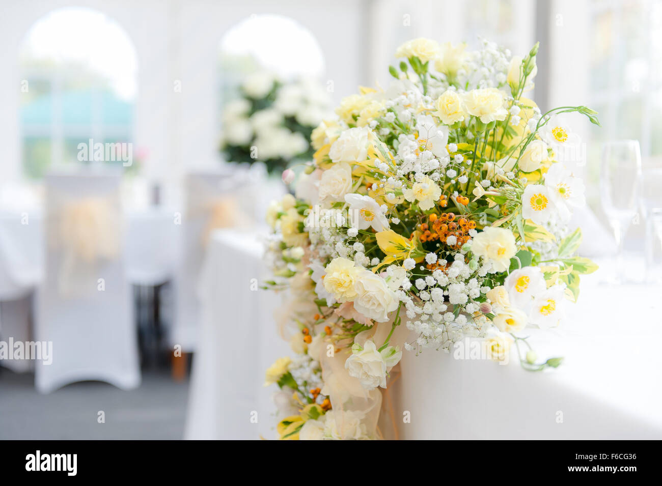 wedding flowers on top table with low depth of field Stock Photo