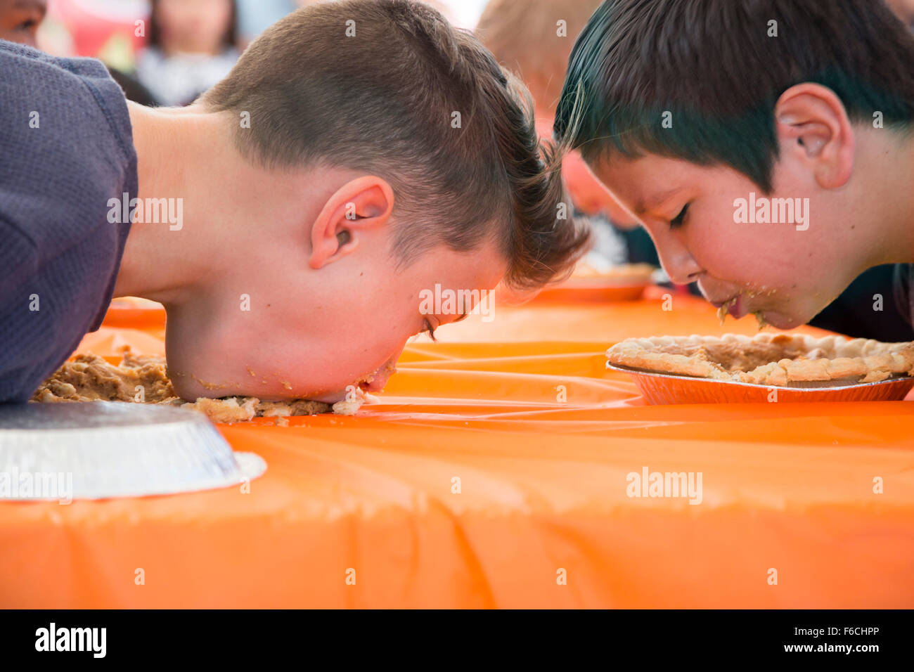 Arvada, Colorado - A pie eating contest at the Festival of Scarecrows, a fall festival in Olde Town Arvada. Stock Photo