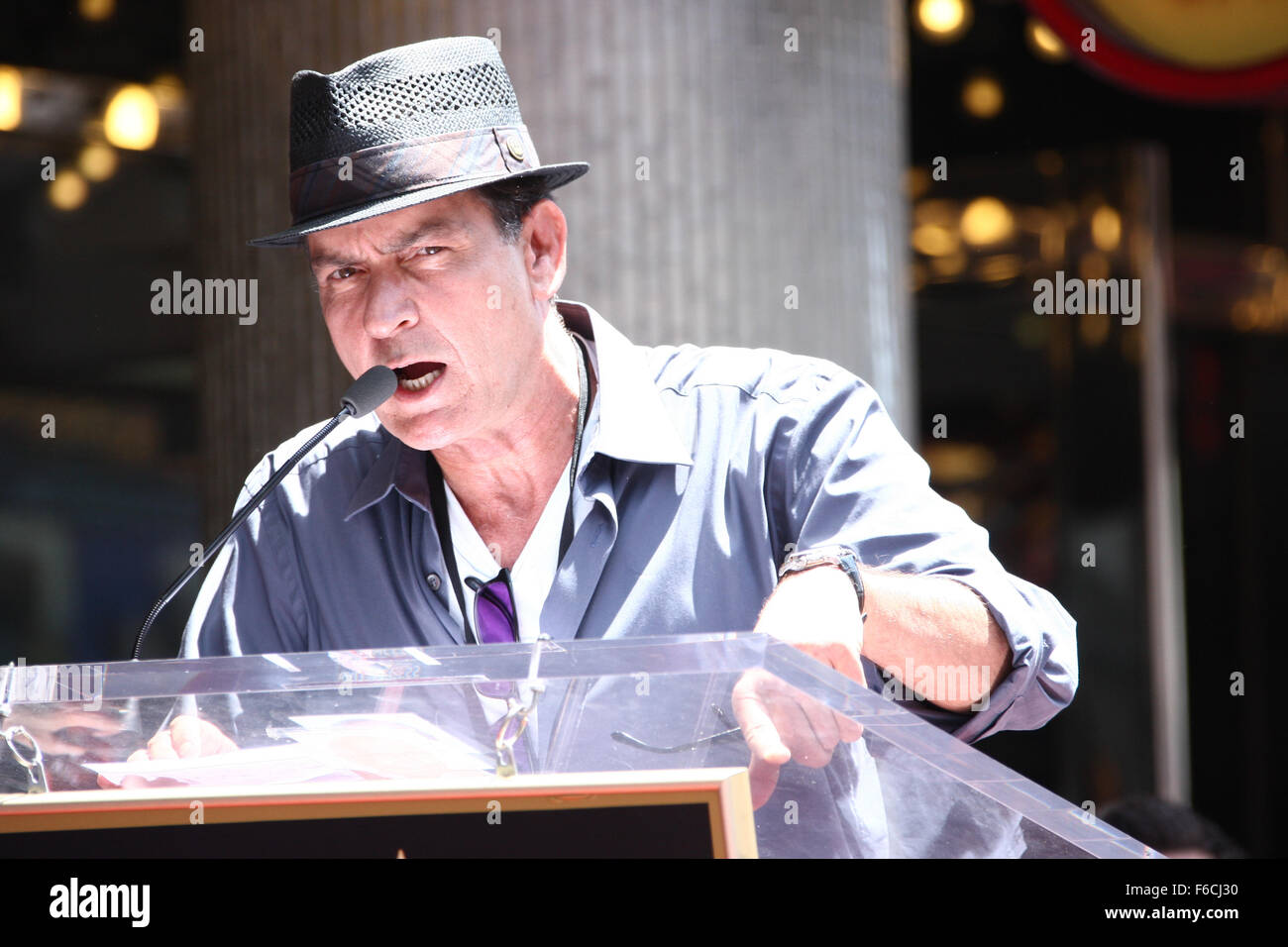 US actor Charlie Sheen speaks during Slash's star ceremony on the Hollywood Walk of Fame in Hollywood, California, USA 10 July 2012. US musician Slash was awarded the 2,473rd star on the Hollywood Walk of Fame in the recording category. Photo: Hubert Boesl Stock Photo