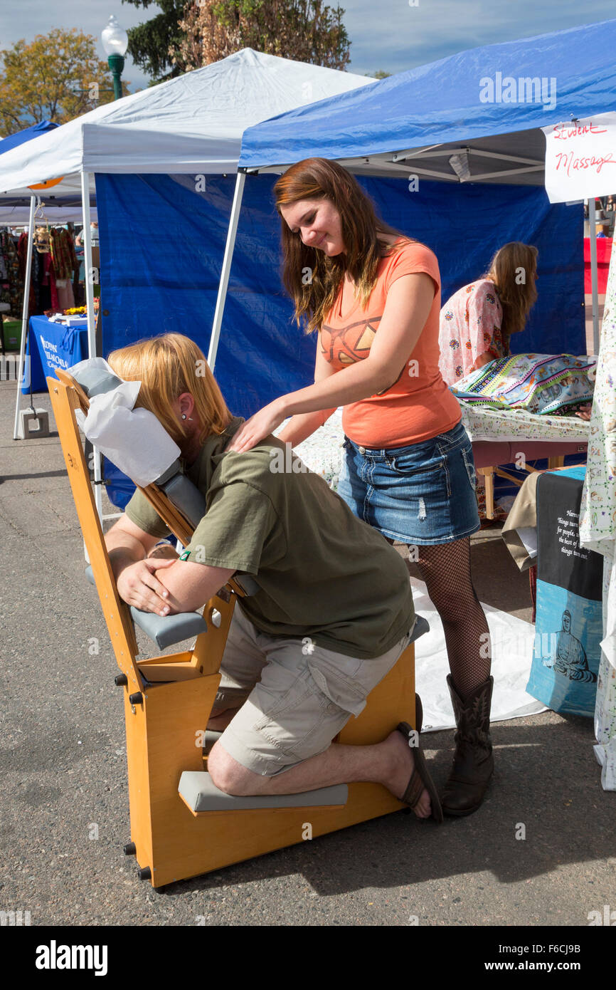 Arvada, Colorado - A man gets a massage from a massage student during the Festival of Scarecrows. Stock Photo