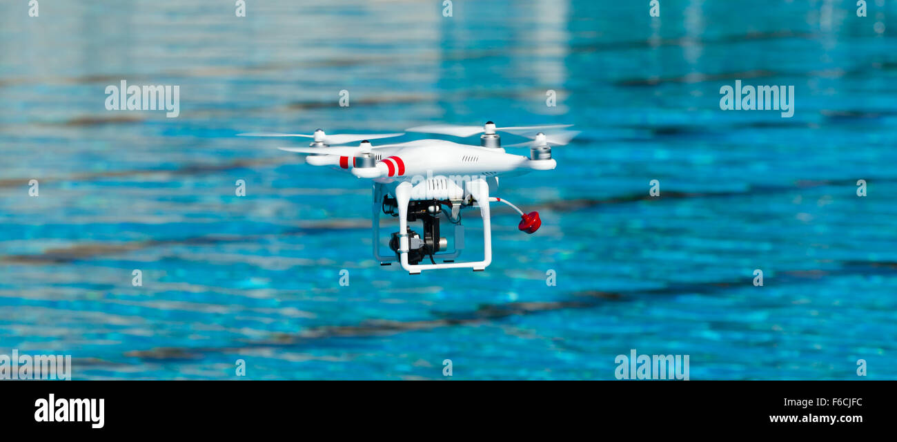 Quadcopter in flight hi-res stock photography and images - Alamy