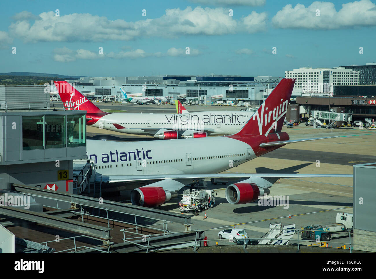 Gatwick Airport with Virgin Atlantic aeroplanes at the gates. Stock Photo