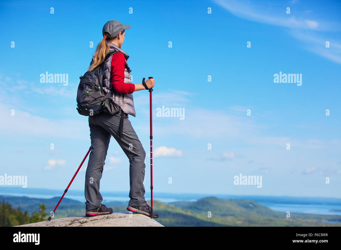 Woman standing on mountain top hi-res stock photography and images - Alamy