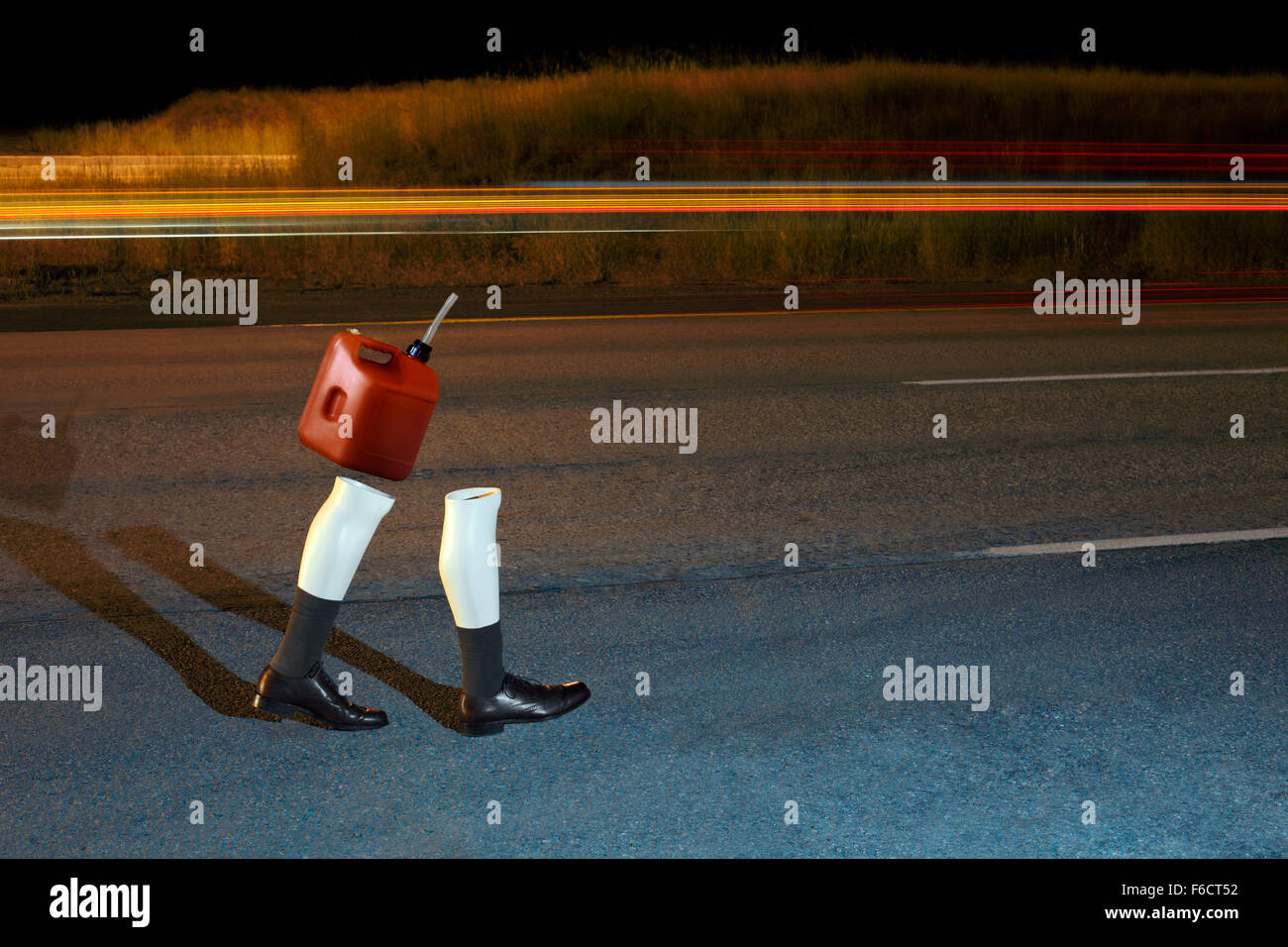 Manikin Legs Walking With a Can Of Gas Stock Photo