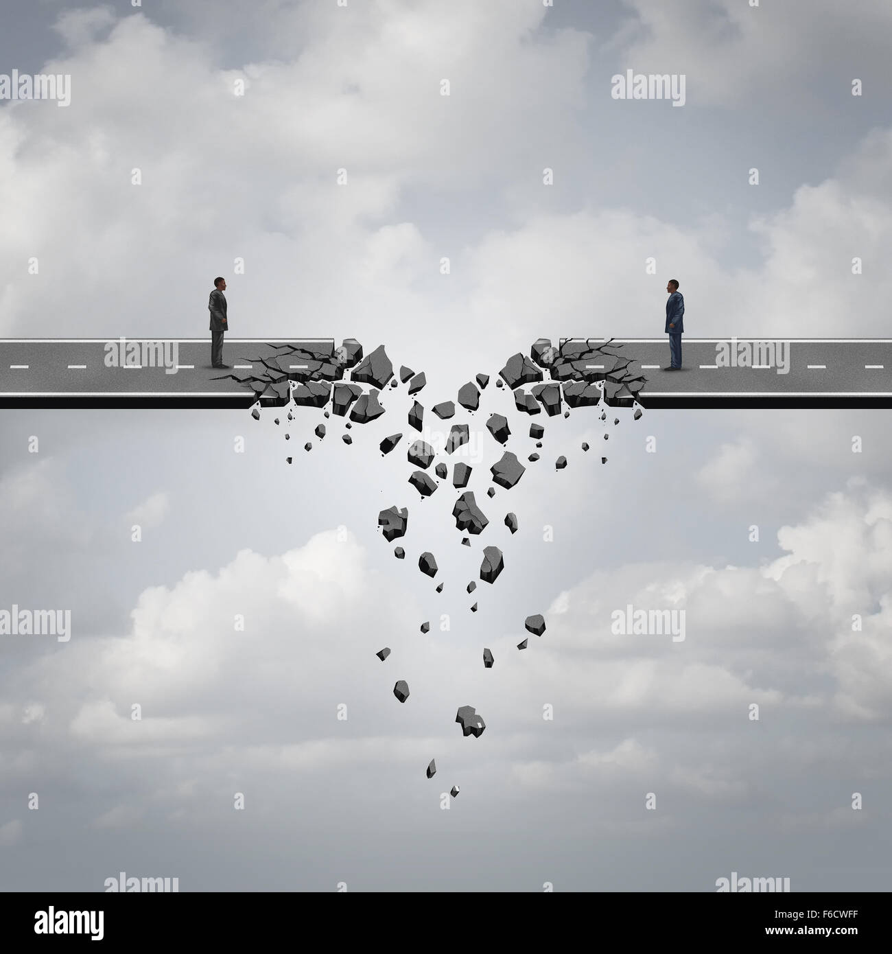 Business deal failure concept as two businessmen on a road bridge that is breaking down and disconnecting as a failing corporate relationship crisis symbol. Stock Photo
