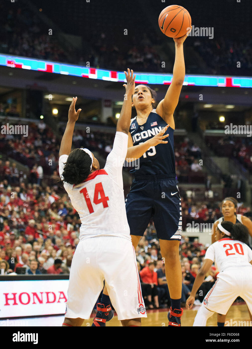 Columbus, Ohio, USA. 16th Nov, 2015. Connecticut Huskies guard Gabby Williams (15) shoots the ball over Ohio State Buckeyes guard Ameryst Alston (14) in the 100-56 victory over Ohio State in Columbus, Ohio. Brent Clark/CSM/Alamy Live News Stock Photo