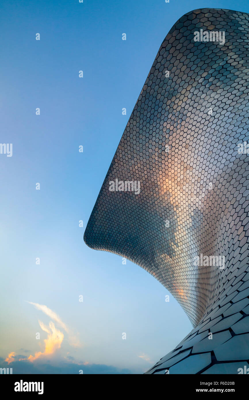 Sunset reflects off the modern Soumaya Museum of Art in Mexico City, Mexico. Stock Photo